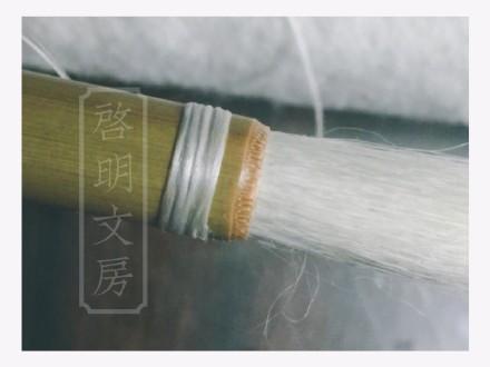 This way, both thread ends are buried inside the wrapped coils. Here's how it looks when finished.