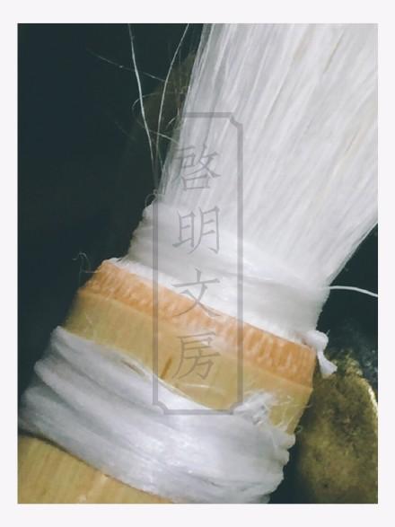 The reason for holding the brush upright with the head up is so that even if you use too much glue