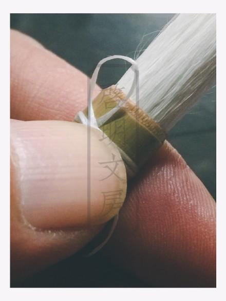 Start wrapping the thread. Usually, five or six wraps are enough.