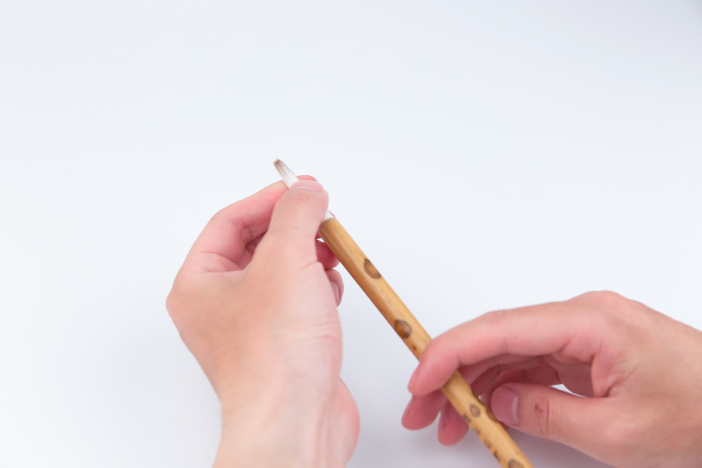 Gently rub the brush head with your fingers