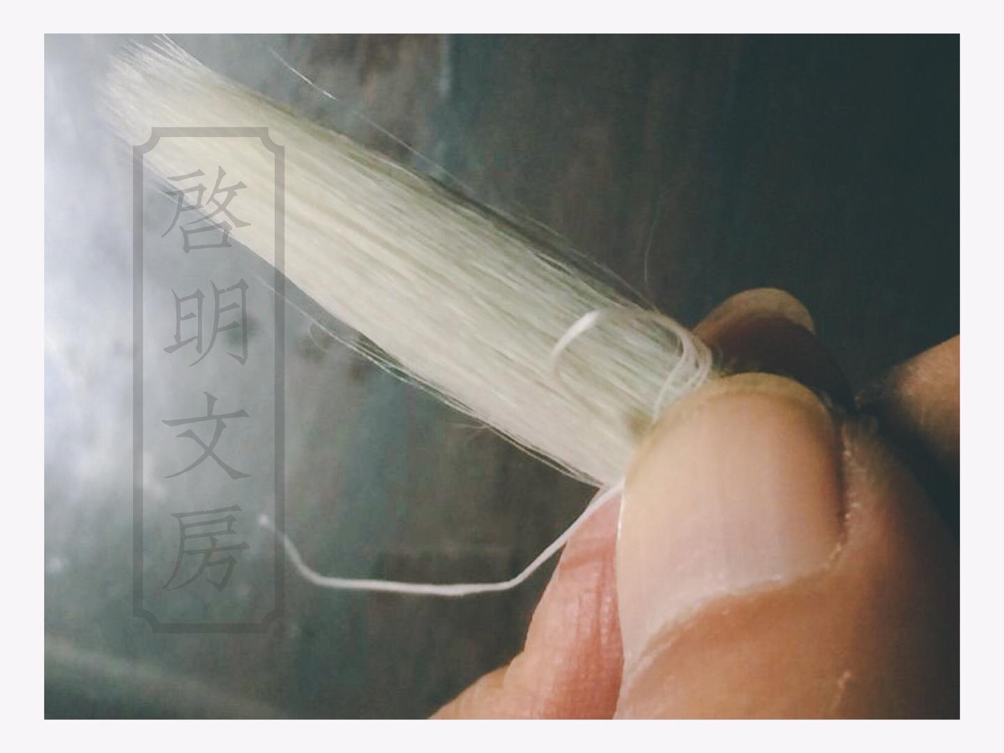 Pull the thread end tight.