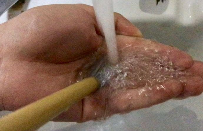 Cup your left hand into a small bowl